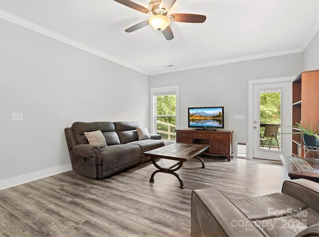 10340 Williams Rd, Mint Hill, NC 28227 - living room with a ceiling fan, wood finished floors, crown molding, and baseboards