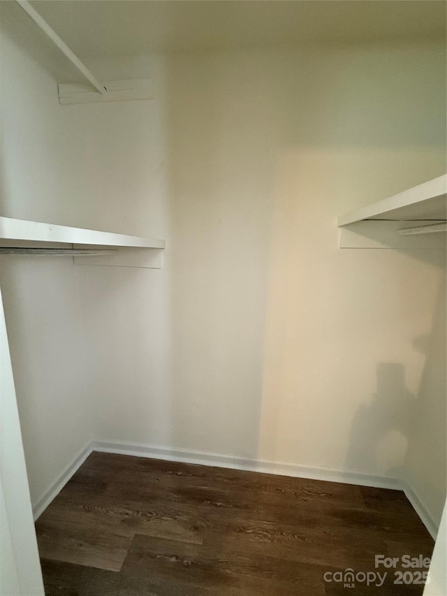 629 Belmorrow Dr, Charlotte, NC 28214 - spacious closet with dark wood-type flooring