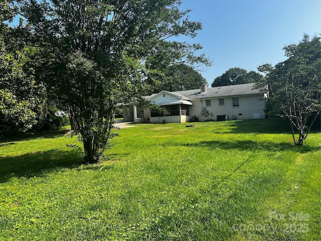 629 Belmorrow Dr, Charlotte, NC 28214 - view of green lawn with cooling unit