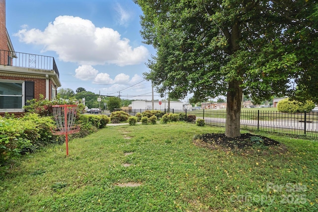 view of yard with fence