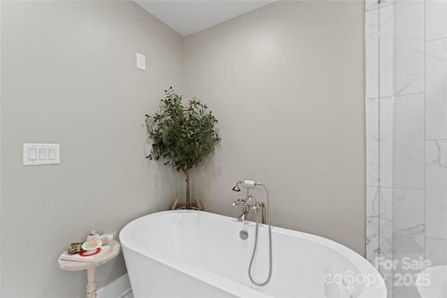 4039 5th St NW, Hickory, NC 28601 - full bath with a freestanding bath and baseboards
