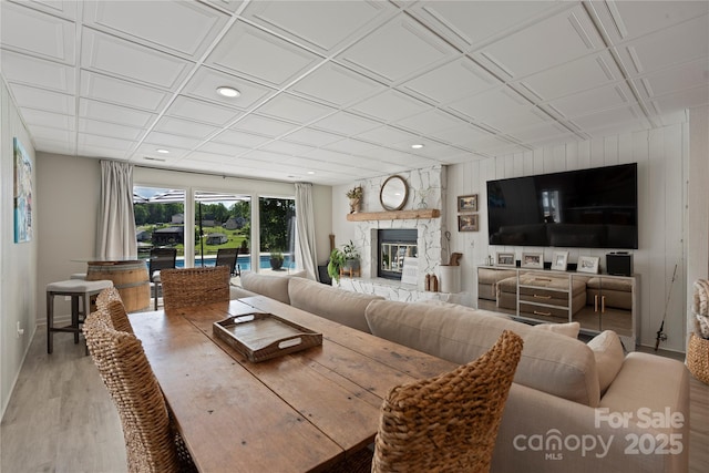 4039 5th St NW, Hickory, NC 28601 - living area with wood finished floors, recessed lighting, a stone fireplace, and baseboards
