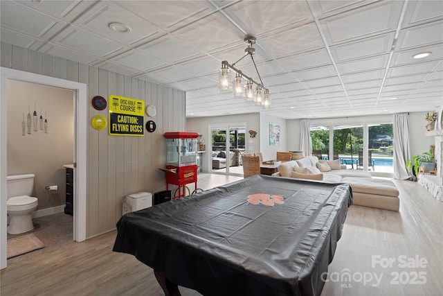 4039 5th St NW, Hickory, NC 28601 - playroom featuring wood finished floors, billiards table, and wooden walls