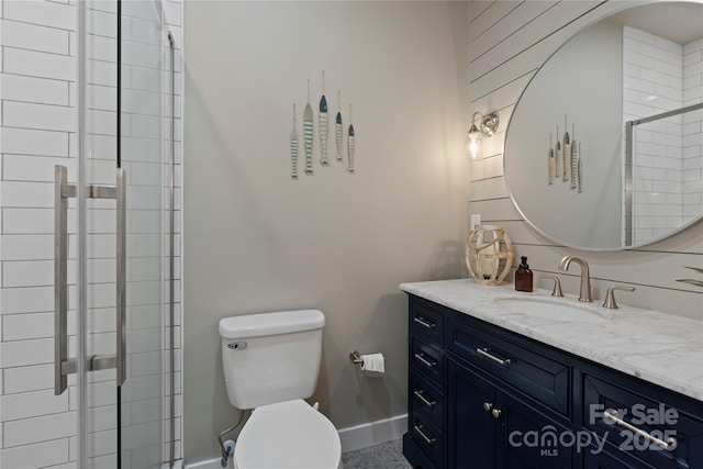 4039 5th St NW, Hickory, NC 28601 - bathroom featuring vanity, toilet, baseboards, and tiled shower