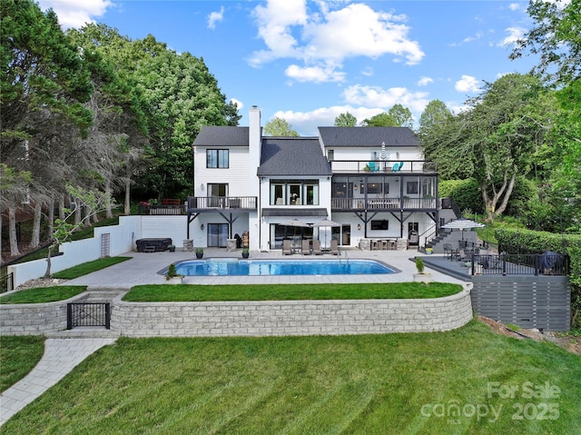 4039 5th St NW, Hickory, NC 28601 - back of property featuring stairway, a balcony, a gate, a patio, and a chimney