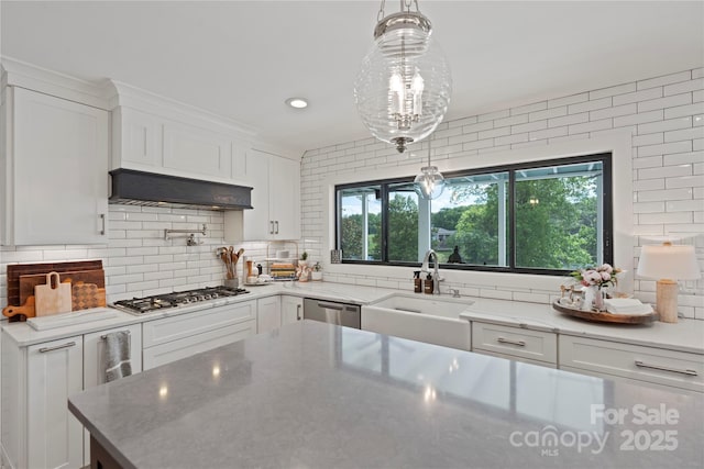 4039 5th St NW, Hickory, NC 28601 - kitchen with a sink, stainless steel appliances, white cabinets, backsplash, and recessed lighting