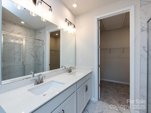 2021 Endeavor Run, Charlotte, NC 28269 - bathroom featuring marble look tile flooring, double vanity, a marble finish shower, a walk in closet, and recessed lighting