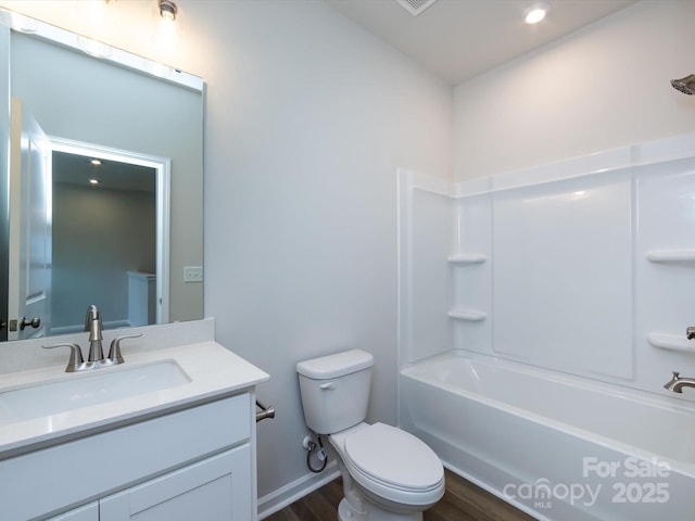 2021 Endeavor Run, Charlotte, NC 28269 - bathroom with wood finished floors, toilet, vanity, and  shower combination