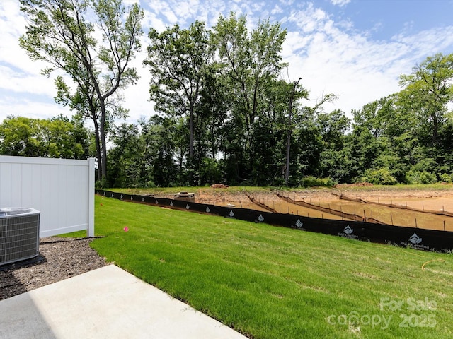 2021 Endeavor Run, Charlotte, NC 28269 - view of yard featuring central AC unit and a patio