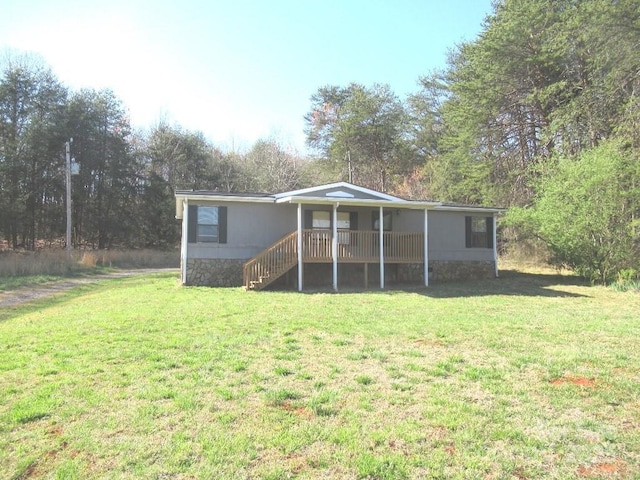 5180 Macedonia Church Rd, Vale, NC 28168 - rear view of house with a lawn