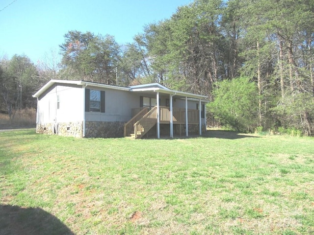 5180 Macedonia Church Rd, Vale, NC 28168 - rear view of house with crawl space and a lawn