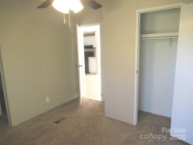 5180 Macedonia Church Rd, Vale, NC 28168 - unfurnished bedroom featuring a closet, carpet flooring, ceiling fan, and visible vents