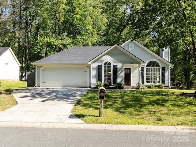 7731 Ivy Hollow Dr, Charlotte, NC 28227 - ranch-style home featuring a chimney, driveway, a shingled roof, an attached garage, and a front yard