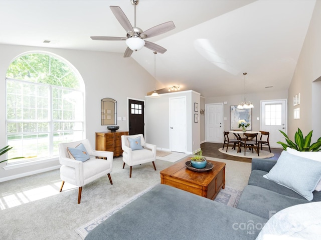 7731 Ivy Hollow Dr, Charlotte, NC 28227 - living area featuring high vaulted ceiling, carpet floors, and baseboards
