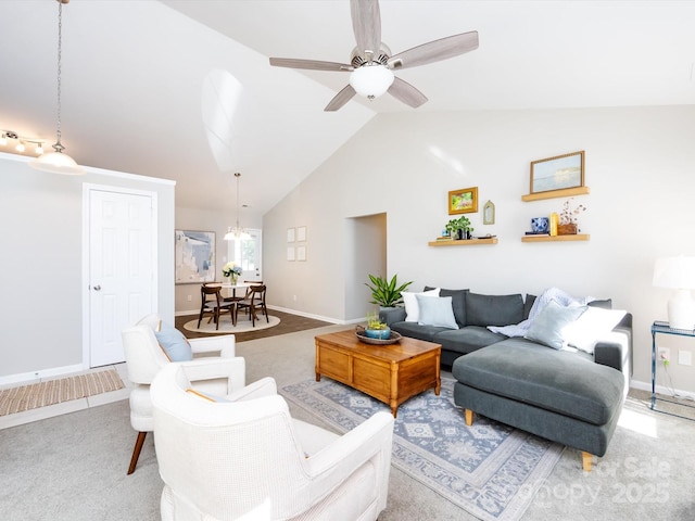 7731 Ivy Hollow Dr, Charlotte, NC 28227 - living area with lofted ceiling, baseboards, carpet floors, and ceiling fan with notable chandelier