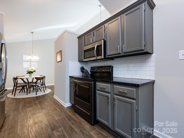 7731 Ivy Hollow Dr, Charlotte, NC 28227 - kitchen with dark wood-style floors, a notable chandelier, decorative backsplash, gray cabinetry, and black appliances