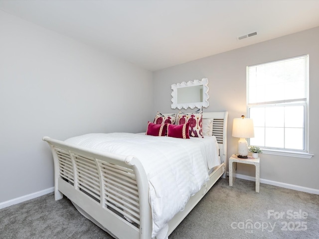 7731 Ivy Hollow Dr, Charlotte, NC 28227 - bedroom featuring baseboards, carpet flooring, and visible vents
