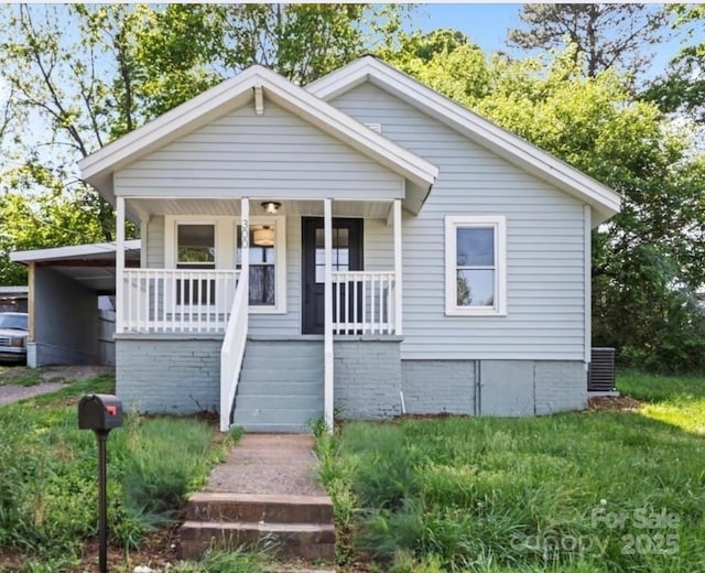 300 N Ervin Ave, Newton, NC 28658 - bungalow-style home with stairs and a porch