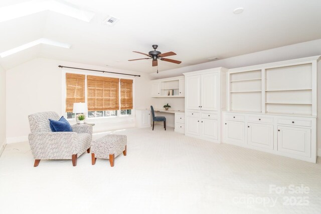 1233 Weymouth Ln, Charlotte, NC 28270 - living area with ceiling fan, visible vents, built in study area, baseboards, and carpet flooring