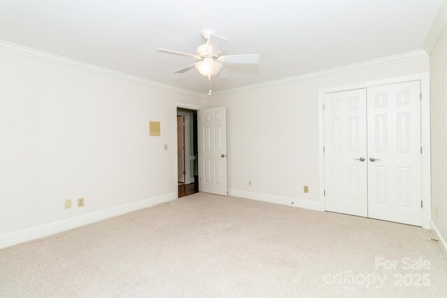 1233 Weymouth Ln, Charlotte, NC 28270 - unfurnished bedroom with baseboards, ornamental molding, carpet, and a closet