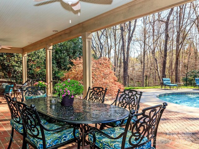 1233 Weymouth Ln, Charlotte, NC 28270 - view of patio featuring fence, a fenced in pool, outdoor dining space, and ceiling fan