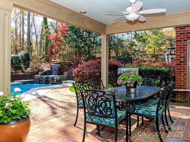 1233 Weymouth Ln, Charlotte, NC 28270 - view of patio featuring a ceiling fan, outdoor dining area, and an outdoor pool