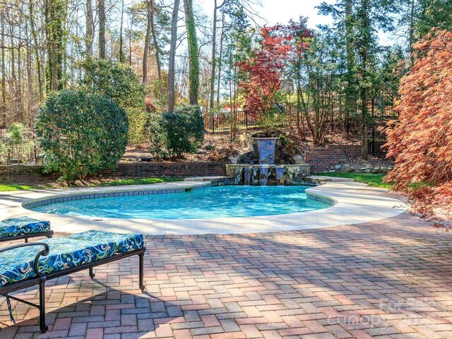 1233 Weymouth Ln, Charlotte, NC 28270 - pool with a patio area