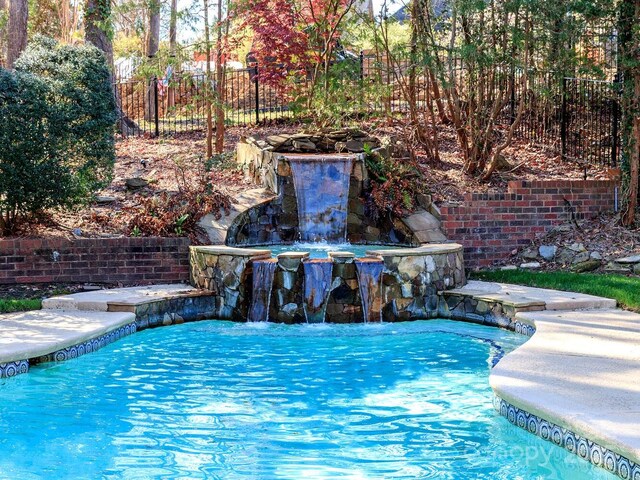 1233 Weymouth Ln, Charlotte, NC 28270 - outdoor pool featuring fence