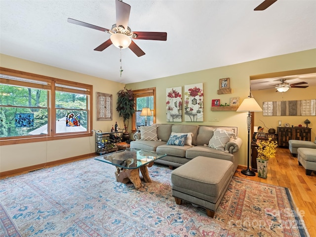 218 Red Oak Dr, Maggie Valley, NC 28751 - living room featuring ceiling fan, wood finished floors, and baseboards