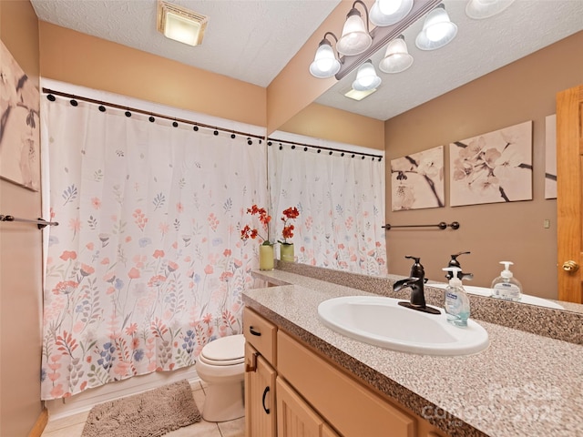 218 Red Oak Dr, Maggie Valley, NC 28751 - full bath featuring tile patterned flooring, toilet, vanity, shower / bath combo, and a textured ceiling