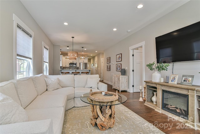 310 Portmanvilla Rd, Black Mountain, NC 28711 - living area featuring dark wood-style flooring, a glass covered fireplace, and recessed lighting