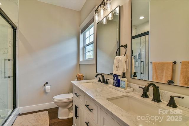 310 Portmanvilla Rd, Black Mountain, NC 28711 - bathroom with baseboards, toilet, a sink, and a stall shower