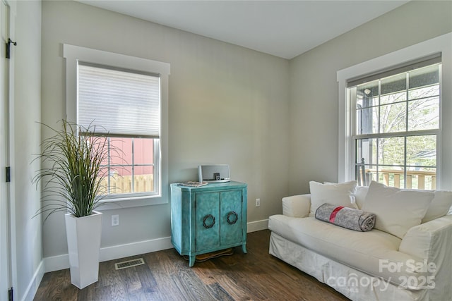310 Portmanvilla Rd, Black Mountain, NC 28711 - sitting room with dark wood-type flooring, a healthy amount of sunlight, baseboards, and visible vents