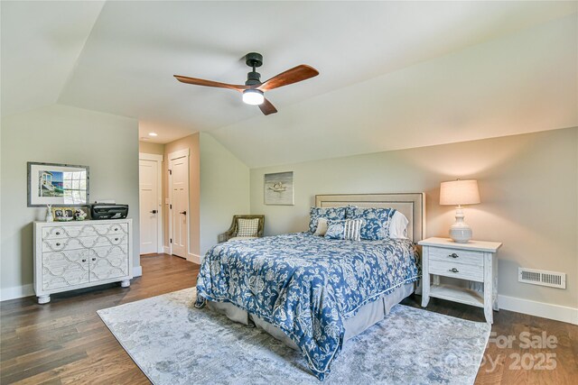 310 Portmanvilla Rd, Black Mountain, NC 28711 - bedroom featuring vaulted ceiling, visible vents, a ceiling fan, wood finished floors, and baseboards