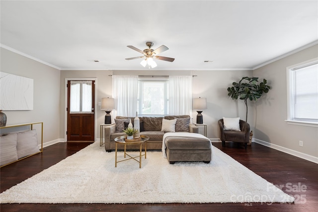 2601 Dora Dr, Charlotte, NC 28215 - living room featuring crown molding, baseboards, and dark wood-style flooring