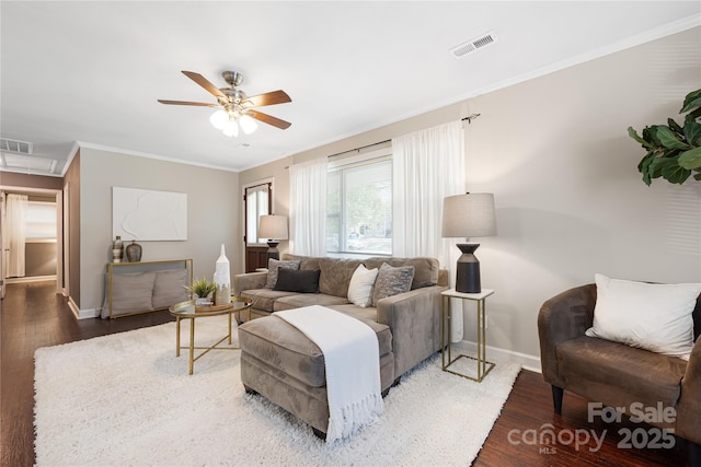 2601 Dora Dr, Charlotte, NC 28215 - living area with attic access, baseboards, visible vents, a ceiling fan, and wood finished floors