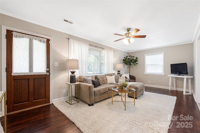 2601 Dora Dr, Charlotte, NC 28215 - living room with baseboards, a ceiling fan, dark wood-style floors, and crown molding