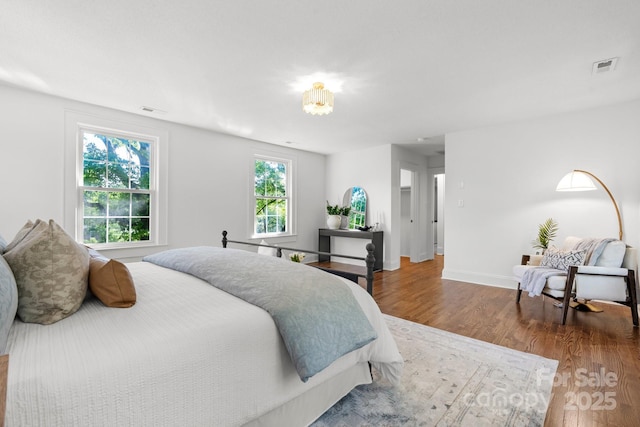 625 4th Street Dr NW, Hickory, NC 28601 - bedroom with visible vents, baseboards, and wood finished floors