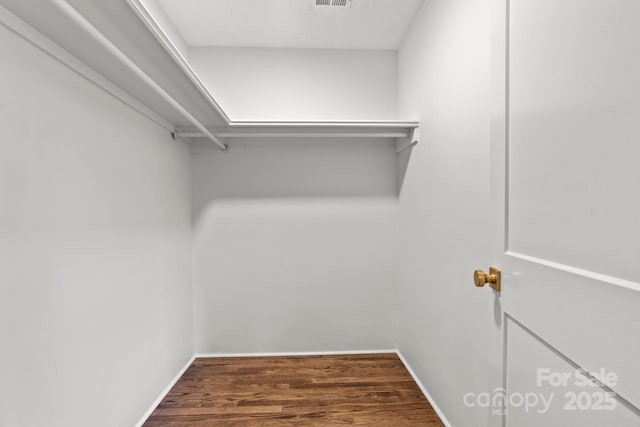 625 4th Street Dr NW, Hickory, NC 28601 - walk in closet with visible vents and wood finished floors