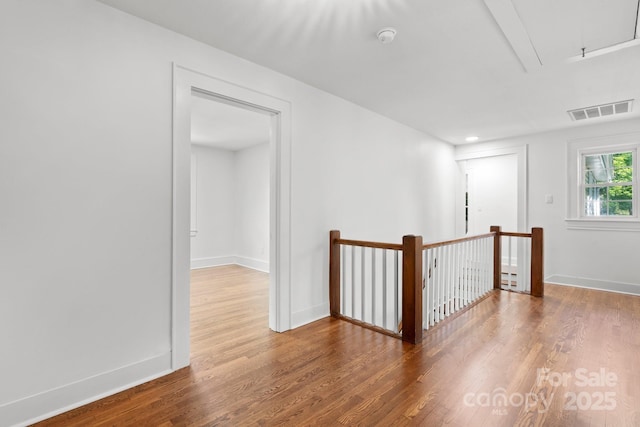 625 4th Street Dr NW, Hickory, NC 28601 - interior space featuring visible vents, attic access, baseboards, and wood finished floors