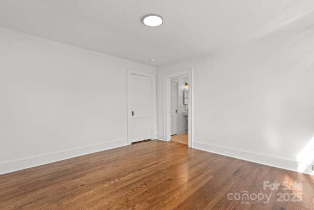 625 4th Street Dr NW, Hickory, NC 28601 - unfurnished room featuring baseboards and wood finished floors