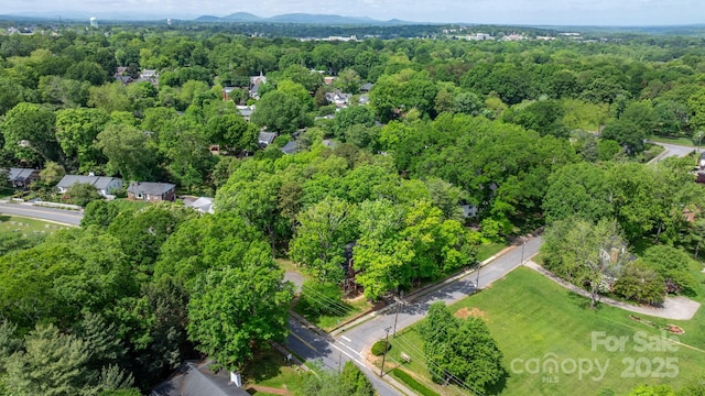 625 4th Street Dr NW, Hickory, NC 28601 - drone / aerial view featuring a wooded view