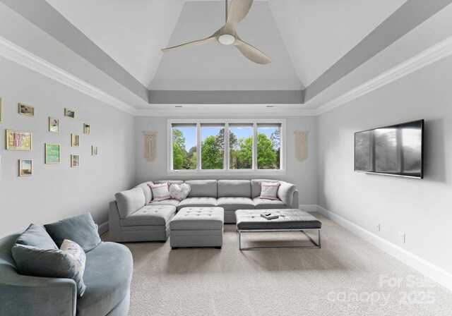 13420 Robert Walker Dr, Davidson, NC 28036 - living room featuring a tray ceiling, carpet floors, a ceiling fan, and baseboards