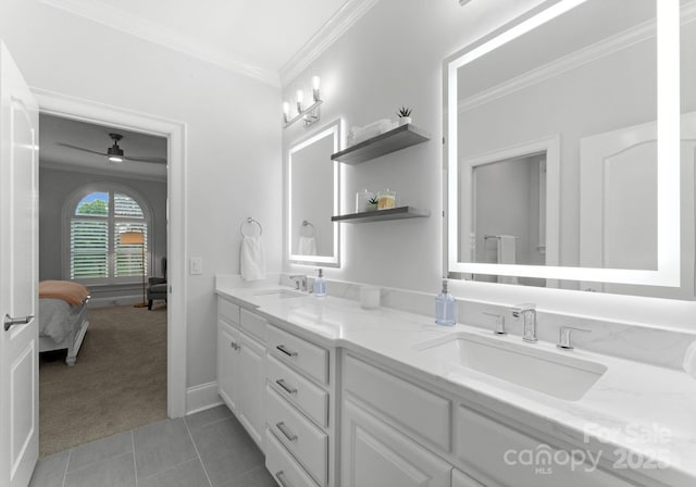 13420 Robert Walker Dr, Davidson, NC 28036 - bathroom featuring ornamental molding, a sink, double vanity, and tile patterned floors