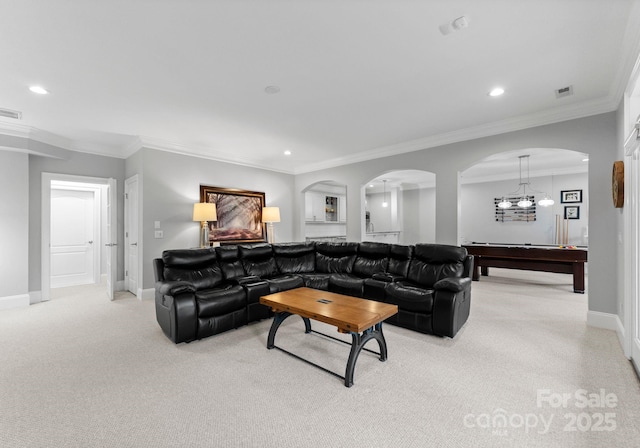 13420 Robert Walker Dr, Davidson, NC 28036 - living room featuring visible vents, crown molding, baseboards, and light carpet