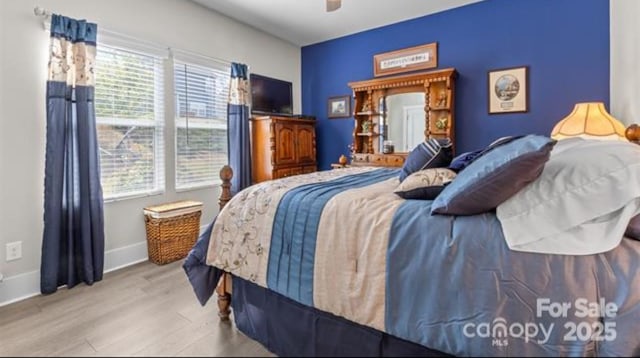 2704 Watergarden St, York, SC 29745 - bedroom with wood finished floors and ceiling fan