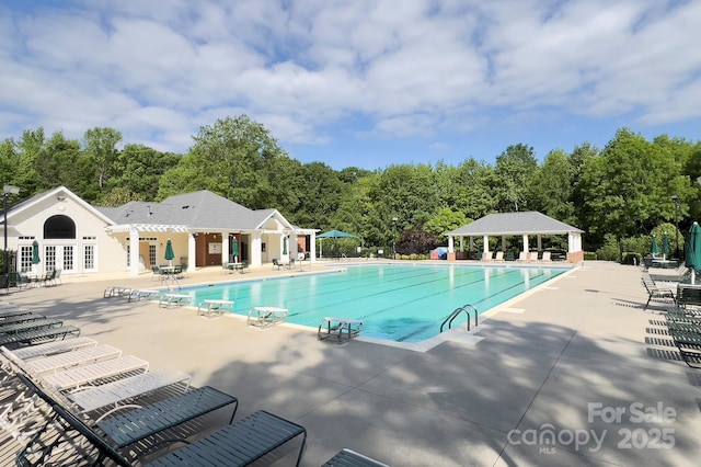 community pool featuring a patio