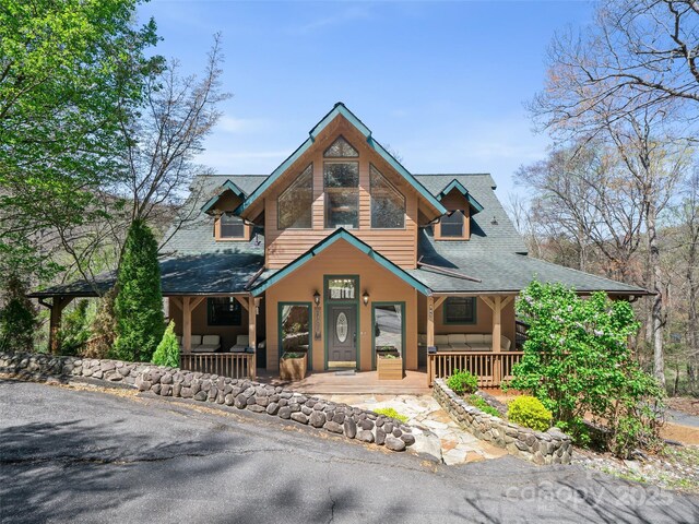 chalet / cabin with a porch