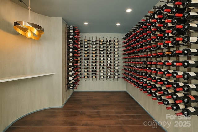 102 Eastham Ct, Mooresville, NC 28117 - wine room featuring dark wood-type flooring and recessed lighting