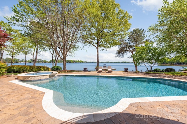 102 Eastham Ct, Mooresville, NC 28117 - view of pool featuring a water view, a patio, and a pool with connected hot tub